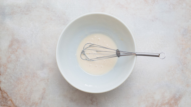 powdered sugar icing in bowl