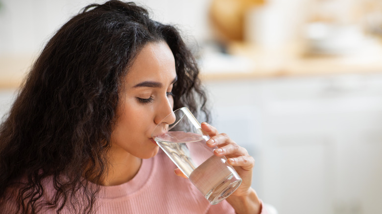 A woman drinking water 