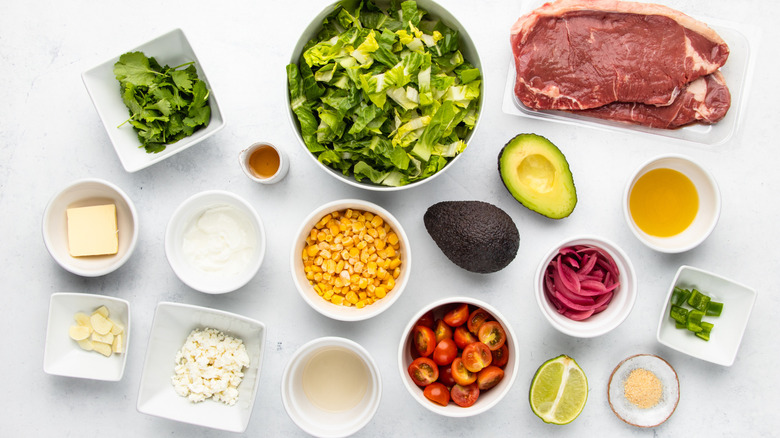Steak taco salad ingredients laid out