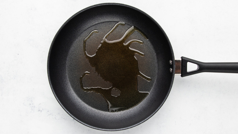 Oil heating in frying pan