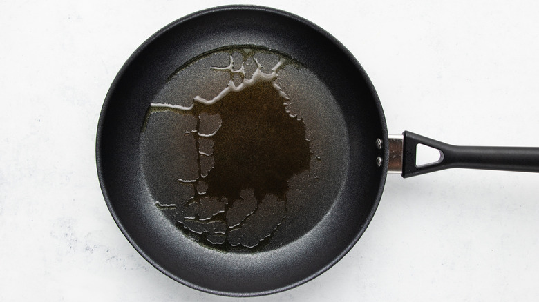 Oil heating in frying pan