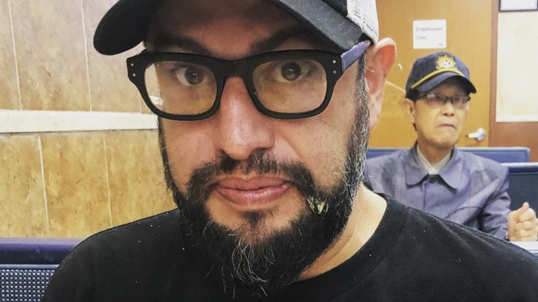 carl Ruiz eating at a restaurant