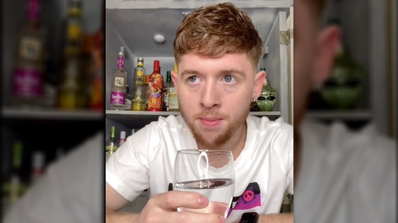 A TikToker trying a tequila hack