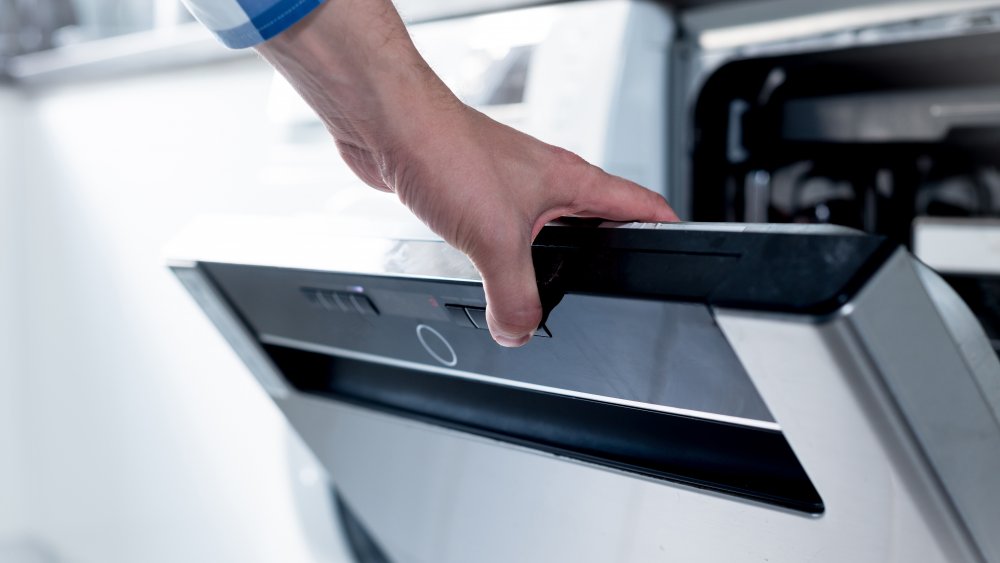 hand opening dishwasher