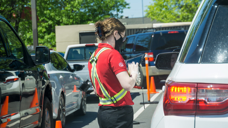 Chick-fil-A worker taking orders