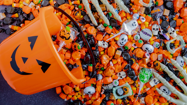 Orange Halloween basket with candy