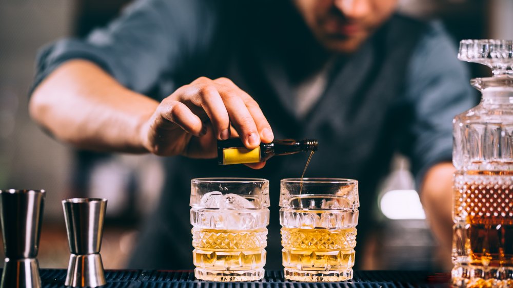 Bartender making cocktails