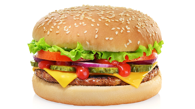 Beautiful cheeseburger on white background