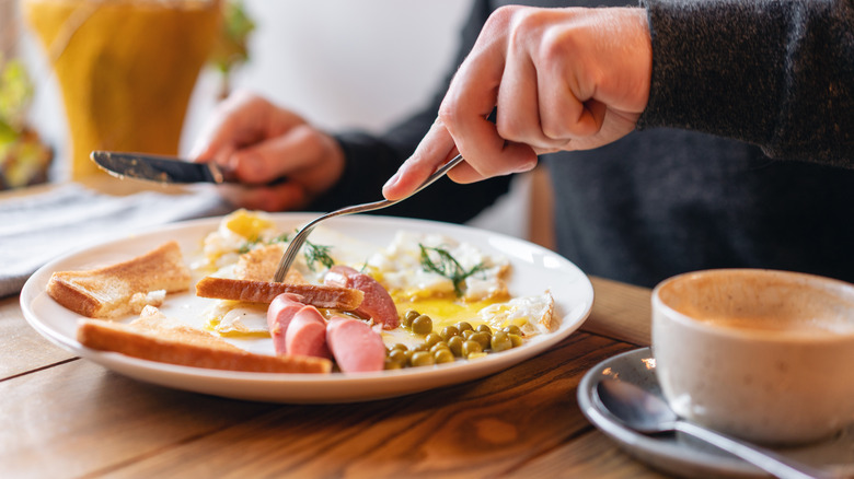 breakfast with toast, meat, eggs