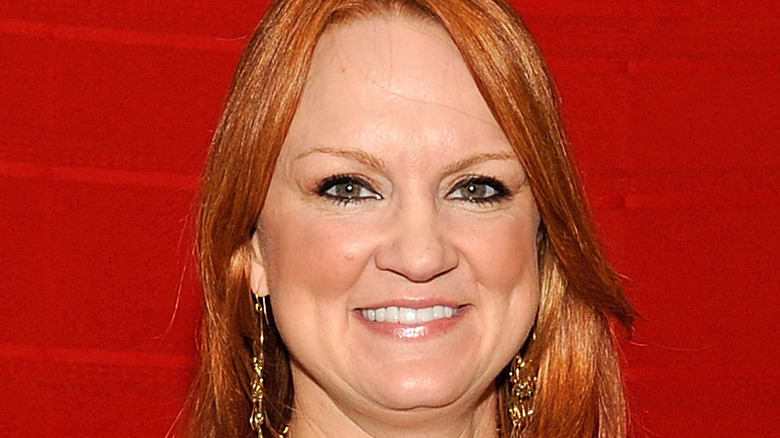 Ree Drummond smiles with gold earrings