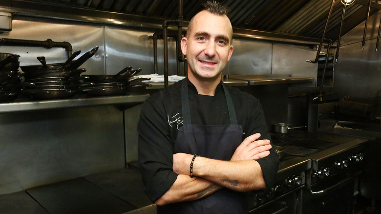 Marc Forgione in a restaurant kitchen