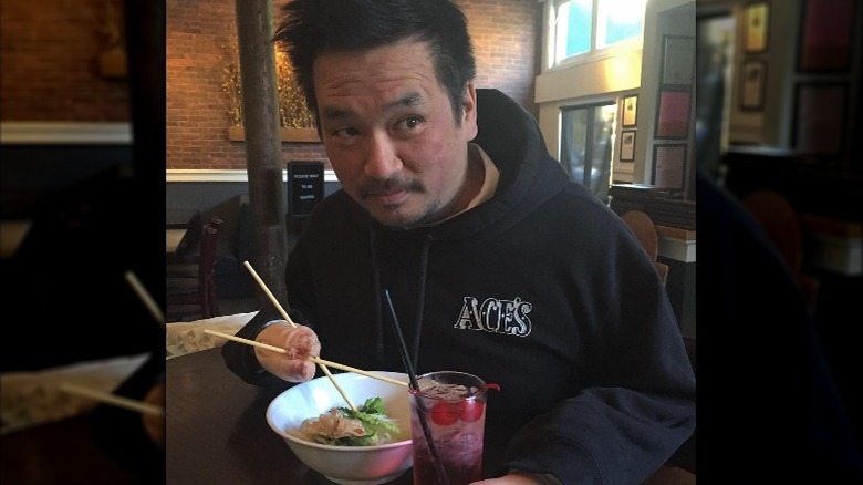 Mike Yakura with chopsticks