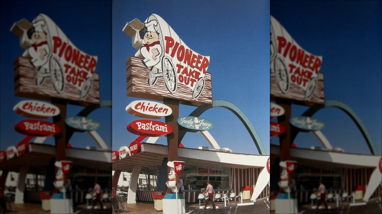 old fashioned pioneer chicken sign and storefront during daytime