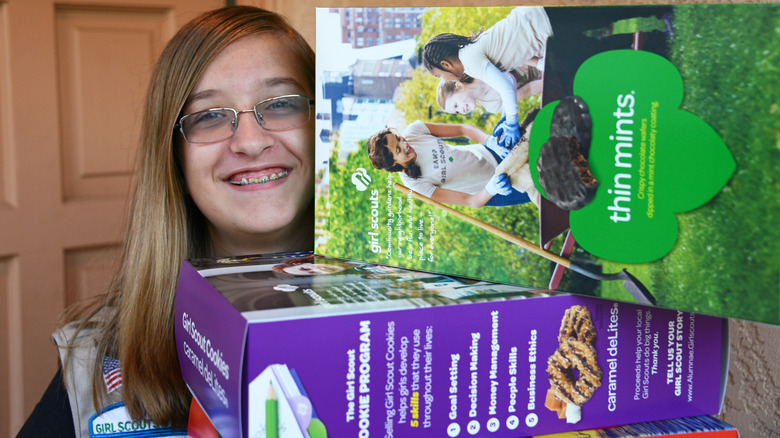 Girl Scout selling cookies