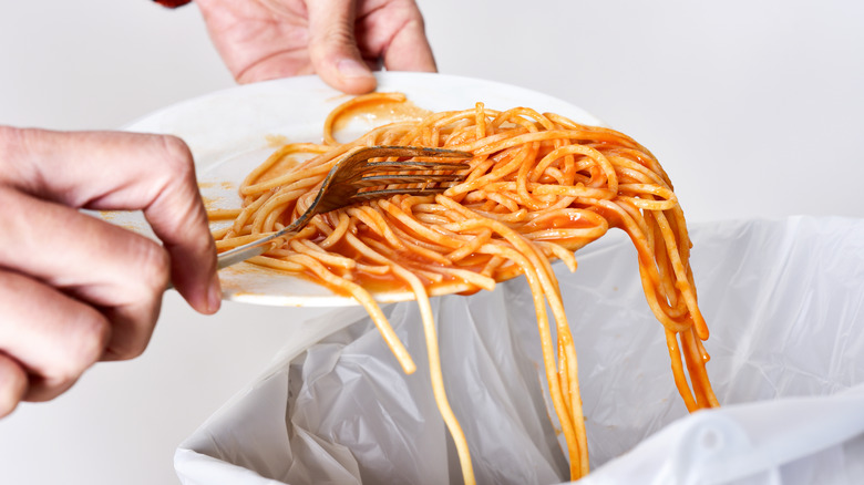 throwing away leftover pasta