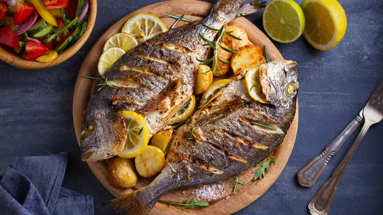Fish and potato dish with lemon slices
