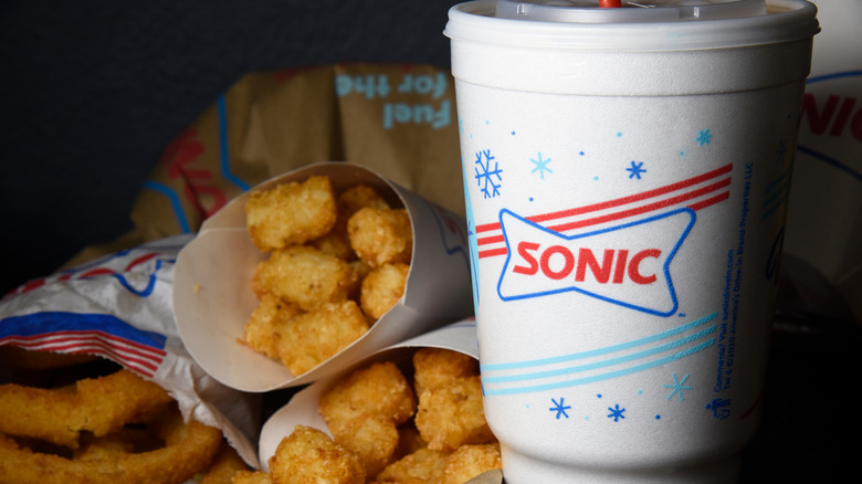sonic drink, tots, and onion rings