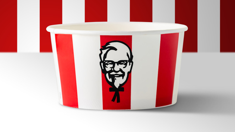 KFC bucket on red and white background