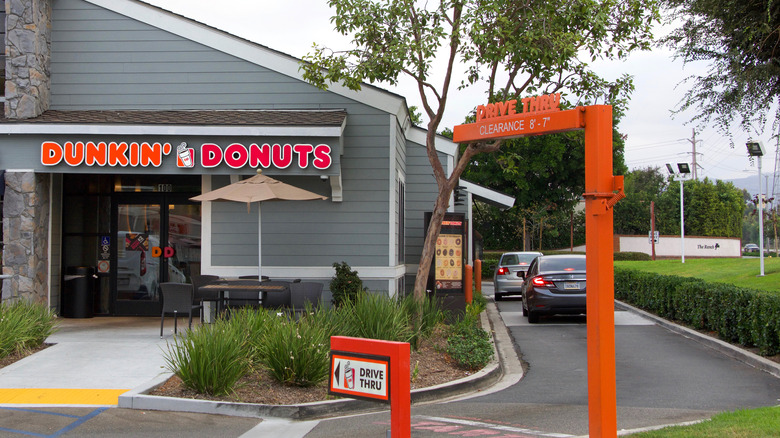 Dunkin' drive-thru with cars