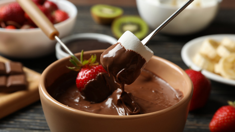 Chocolate fondue with strawberry and marshmallow