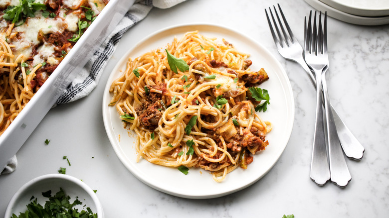 plate of spaghetti and forks