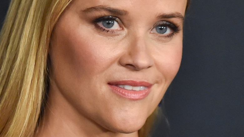 Reese Witherspoon with hair down and slight smile