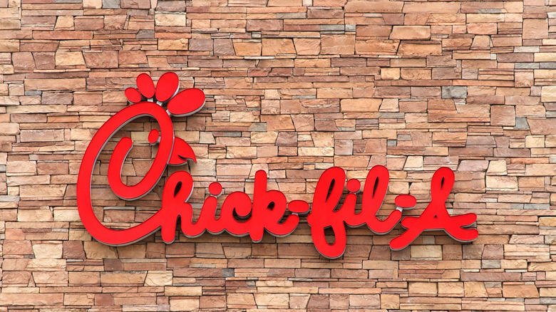 Chick-fil-a logo on brick building
