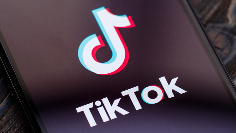 TikTok icon on cell phone