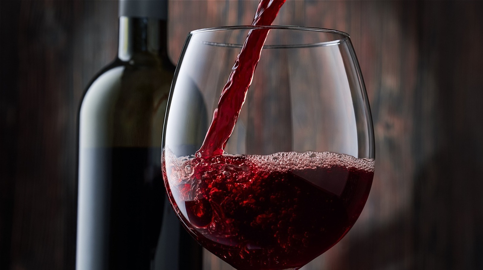 TikTok Is Divided On Using A Hair Straightener As A Wine Opener