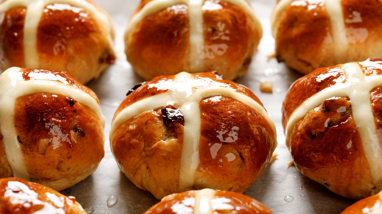 Hot cross buns with icing on a tray