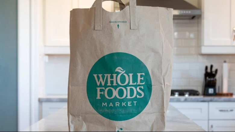 Whole Foods bag in white kitchen