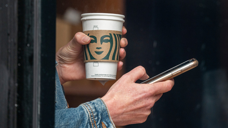 Starbucks customer with phone