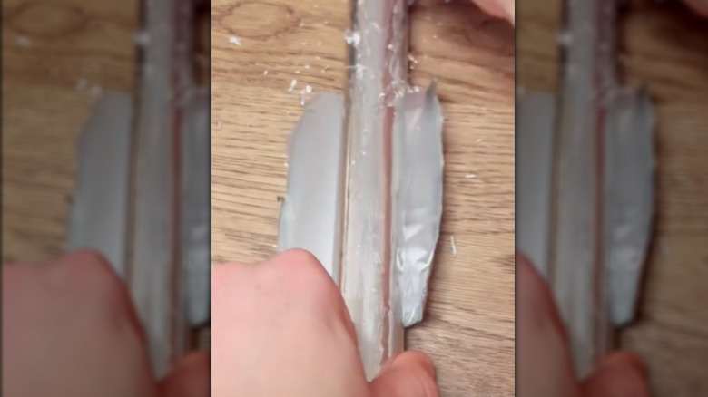 A screenshot from a video with aluminum foil