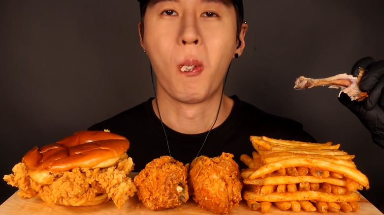 Zach Choi eating Popeyes
