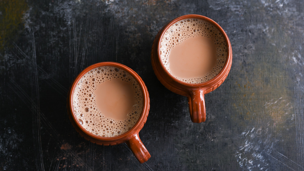 Cup of milky tea from above