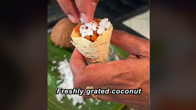 A fried shrimp cone with coconut topping