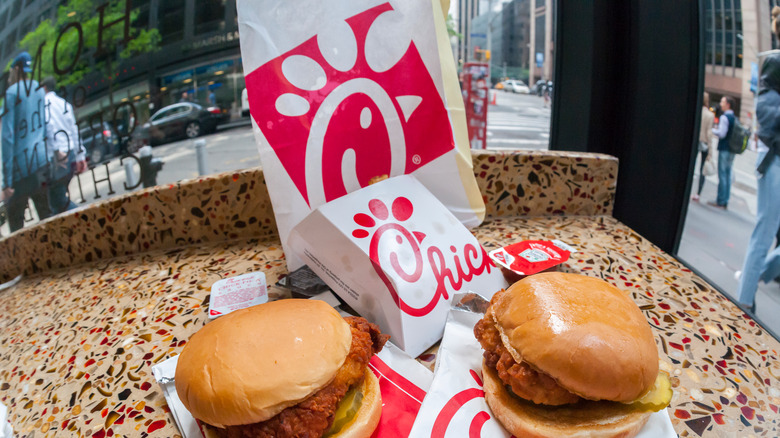 Spicy and original chicken sandwich with fries