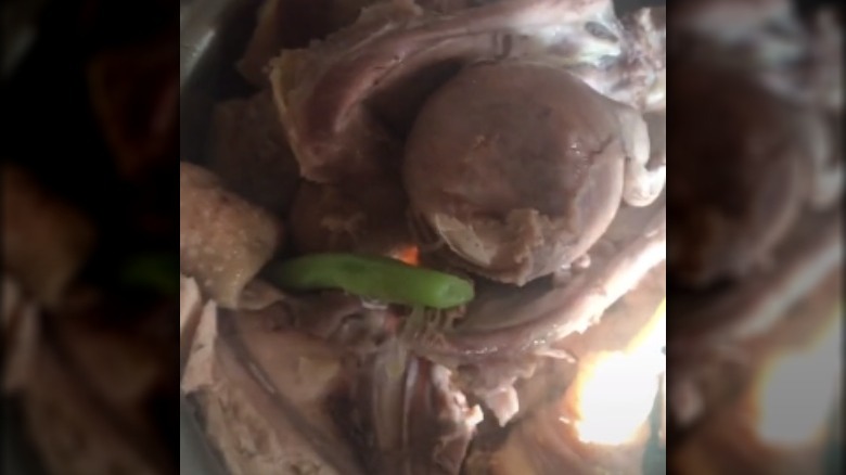 Egg inside cooked chicken