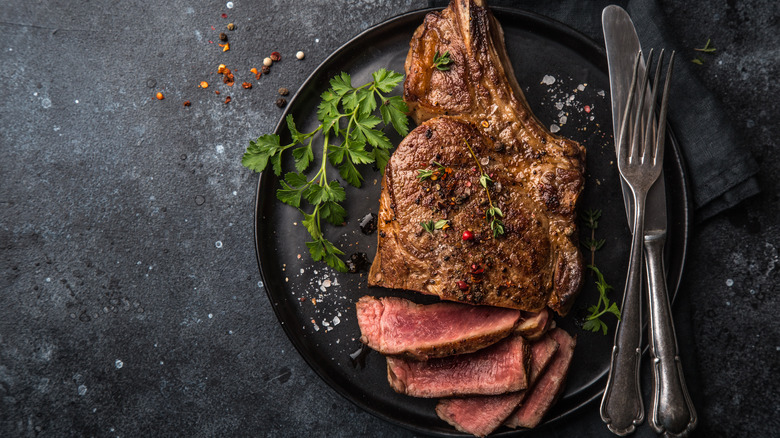 Sliced bone-in ribeye steak