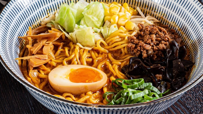 ramen and garnishes in bowl