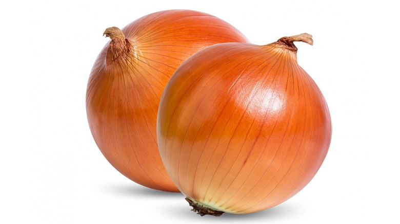 Two unpeeled onions