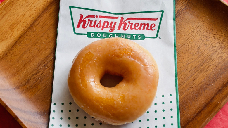 Donut on a Krispy Kreme bag