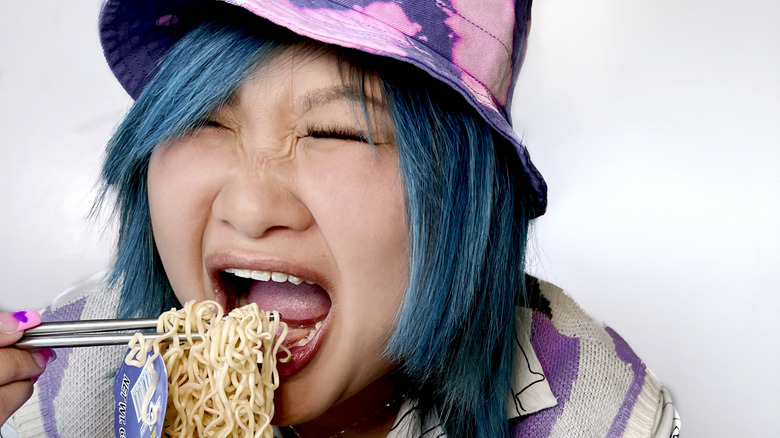 Soy Nguyen eating ramen