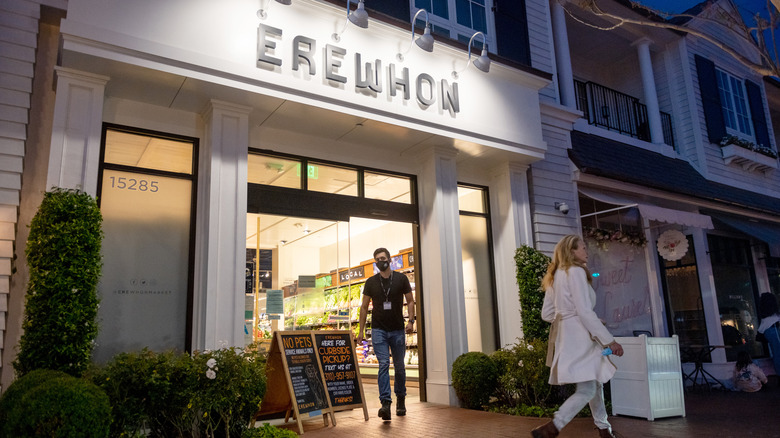 People exiting Erewhon storefront