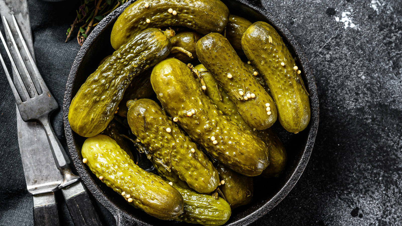 TikTok's Bizarre New Snack Trend Combines Snickers Bars And Pickles