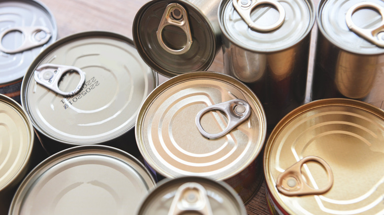 Ten unopened cans of food 