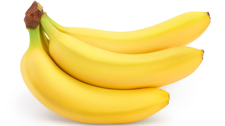 Yellow bananas on white background