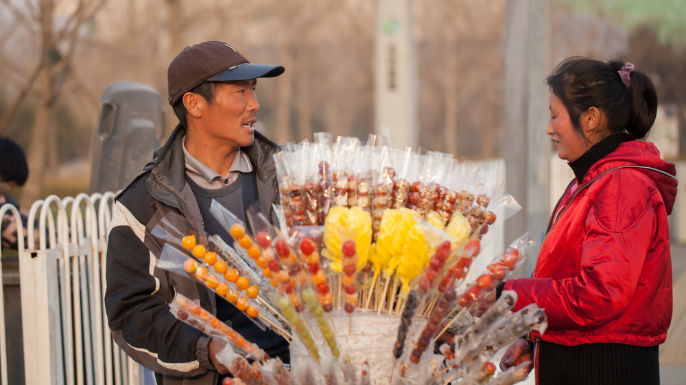 Beijing street vendor selling candied fruit