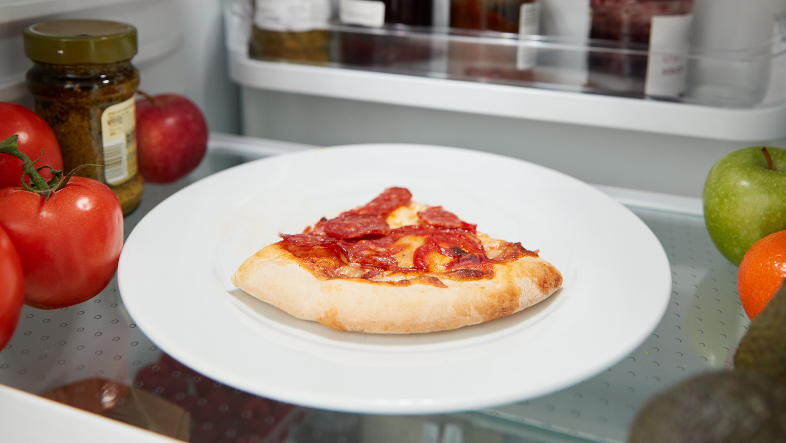 TikTok's Ultimate Stove Top Trick For Perfectly Reheated Pizza Mashed