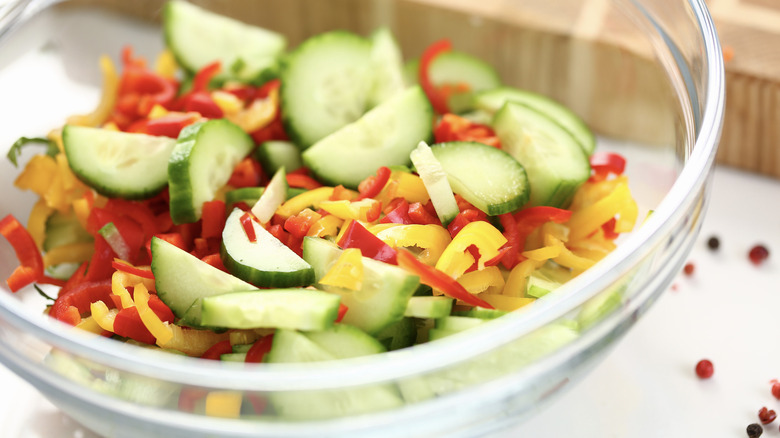 chopped cucumbers and peppers